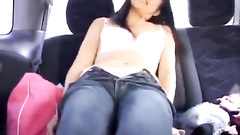 Pretty young Asian chick hotly undresses in the car