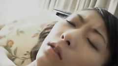 Adorable Asian teen sexily undresses and hotly masturbates cunt